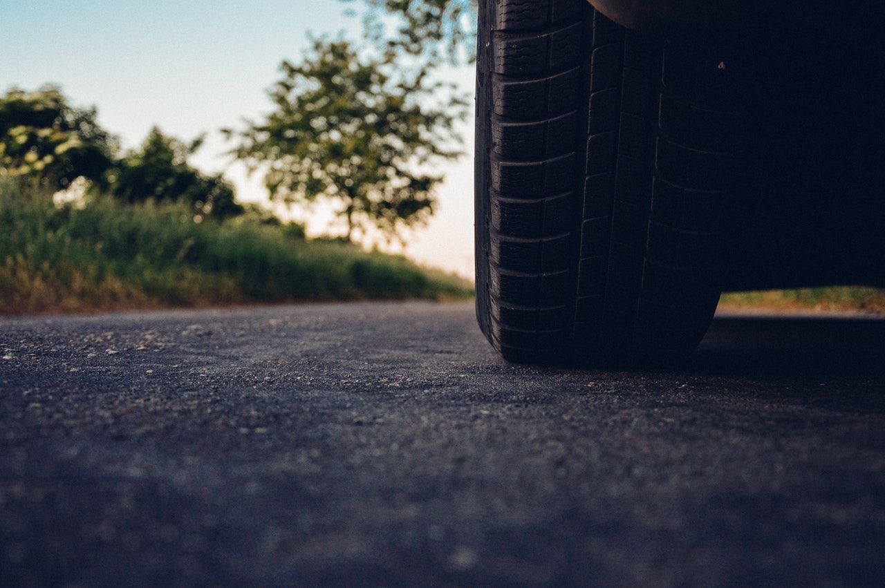 View of car's tire on road